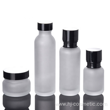 High-grade Cosmetic Frosted glass bottle with black caps, frosted glass bottles/jars